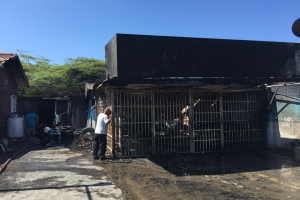 Candela feroz a destrui restaurant y tire shop 