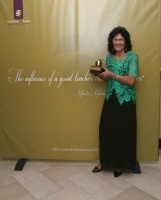 Appel di Oro ta simbolisa trabou excelente den enseñansa 