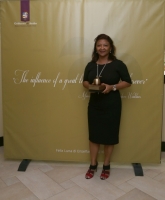 Appel di Oro ta simbolisa trabou excelente den enseñansa 