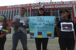 Grupo di Venezolano na Aruba protestando contra violencia na Venezuela