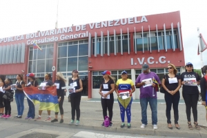 Grupo di Venezolano na Aruba protestando contra violencia na Venezuela