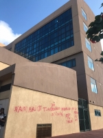 Grafiti riba muraya di DIMAS pa alerta riba trahadonan ilegal