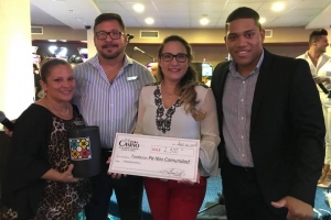 The Casino na Hilton ta presenta FPNC cu un cheque generoso