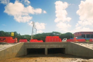 DOW: Contratista a basha concrete pa canal di awa pa Watty Vos Blvd 