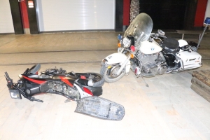 Hoben riba scooter no kier a para pa Polis motoriza