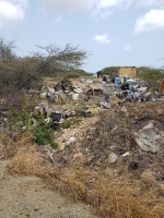 Polis a tuma accion riba dumpnan illegal rond di Aruba  
