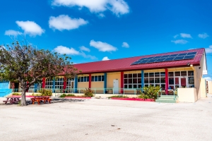 Colegio Cristo Rey a ricibi nan solar panels oficialmente di WoH di AAA