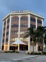 AIB Bank N.V. ta tuma  Banco di Caribe (Aruba) N.V. over!