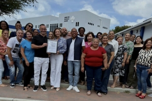 Departamento di Asunto Social a ricibi su certificacion oficial di ISO 9001