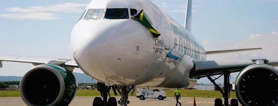  Rutanan di Frontier Airlines tuma di Spiri Airlines den Caribe por beneficia Aruba 