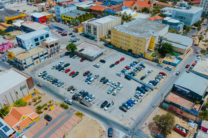 Government studies parking garage with housing and offices in downtown Oranjestad